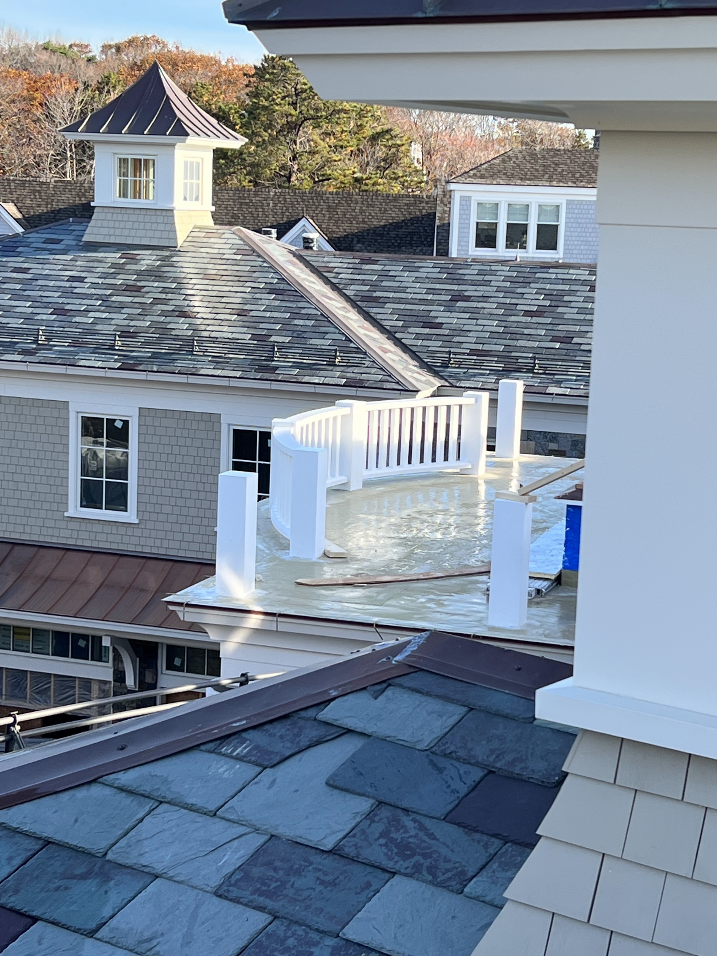 Slate roof, cedar shingles and cupola detail