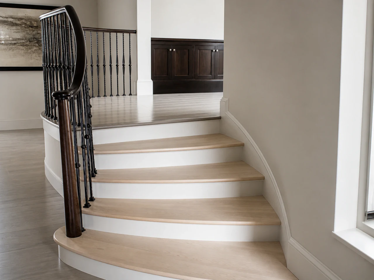 Sculptural curved stair with carefully aligned wood details