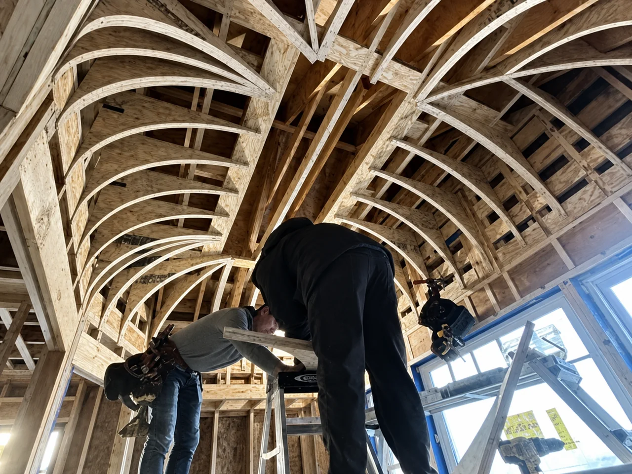 Arched framing geometry coordinated before finish work
