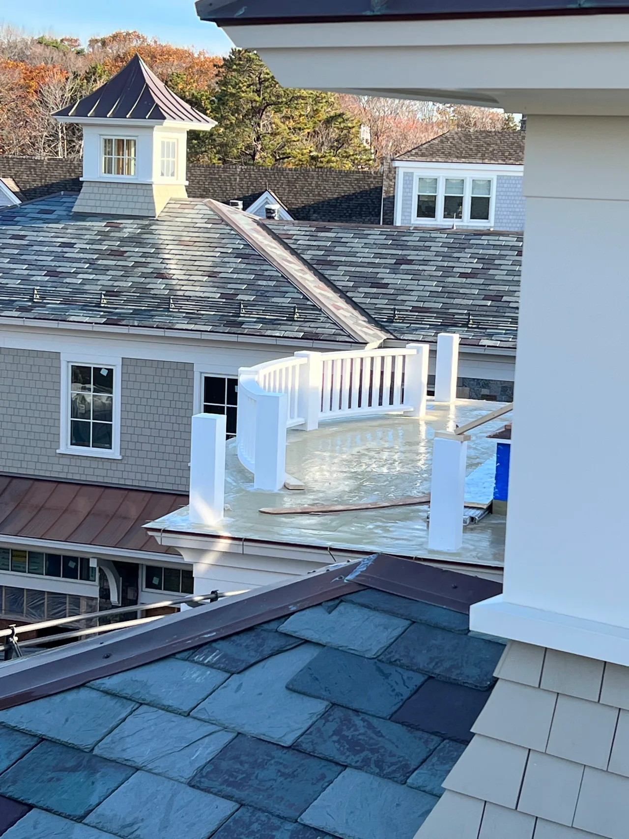Slate roof, cedar shingles and cupola detail